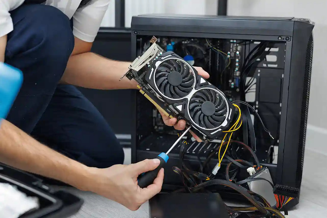 Gamer upgrading a GPU in a gaming PC, highlighting one of the top six PC upgrades to boost gaming performance